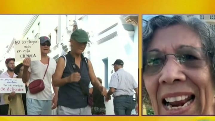 Imagen del artículo de Univision / TeleOnce: Protestan en Escambrón tras firma de Miguel Romero a proyecto de estacionamiento